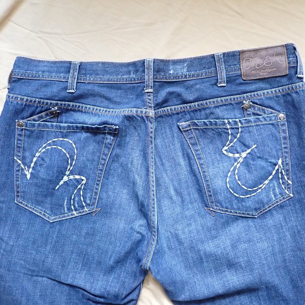 Marc Ecko Men's 40W/31”L Jeans/Bootcut/ Dark blue denim/pocket details.,